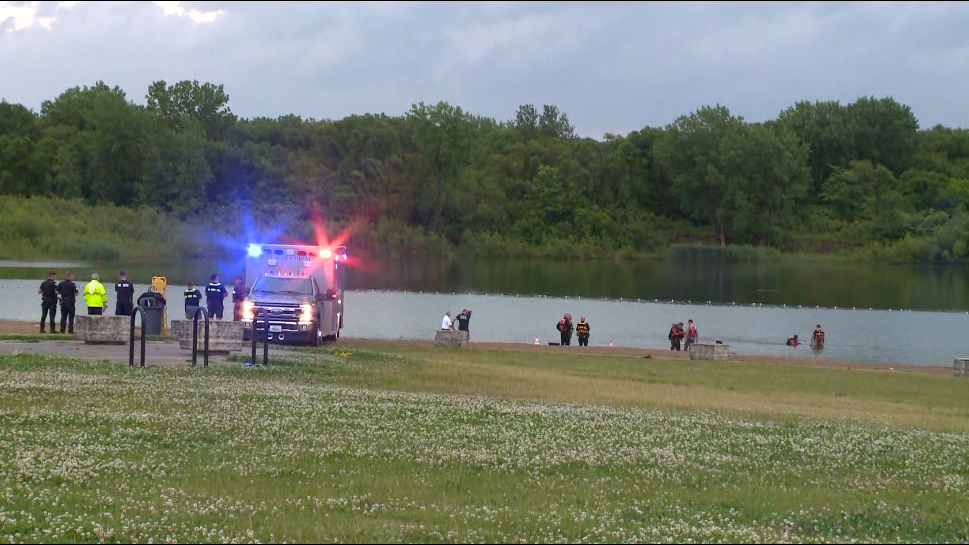 Witnesses say they saw an 18-year-old man go under the water while swimming, but did not see him come back up.