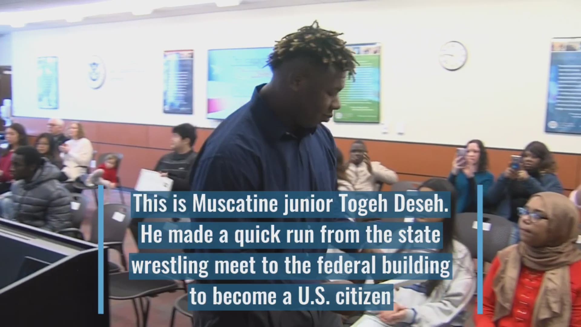 Togeh Deseh, a wrestler at Muscatine High School, slipped out of Wells Fargo Arena for a naturalization ceremony in downtown Des Moines on Friday.