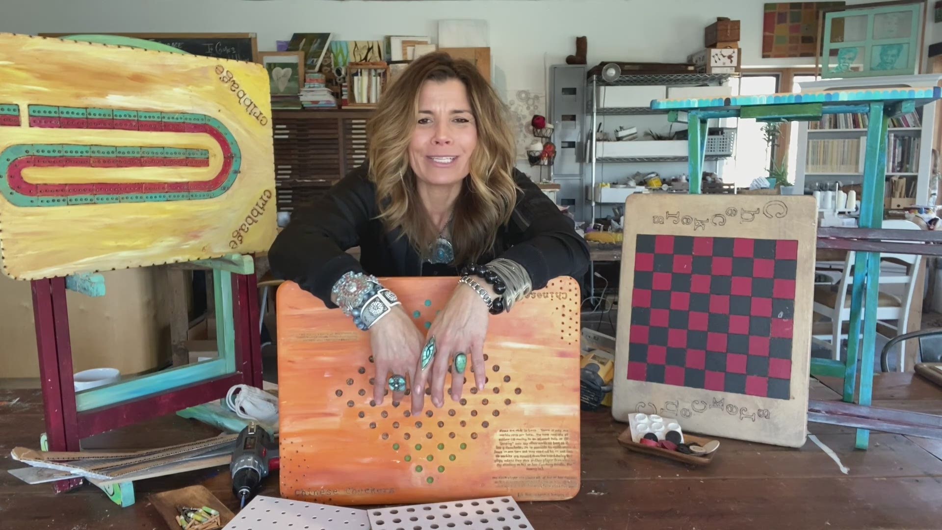 Playing board games can be taken up a level by making your OWN game board from a TV tray!