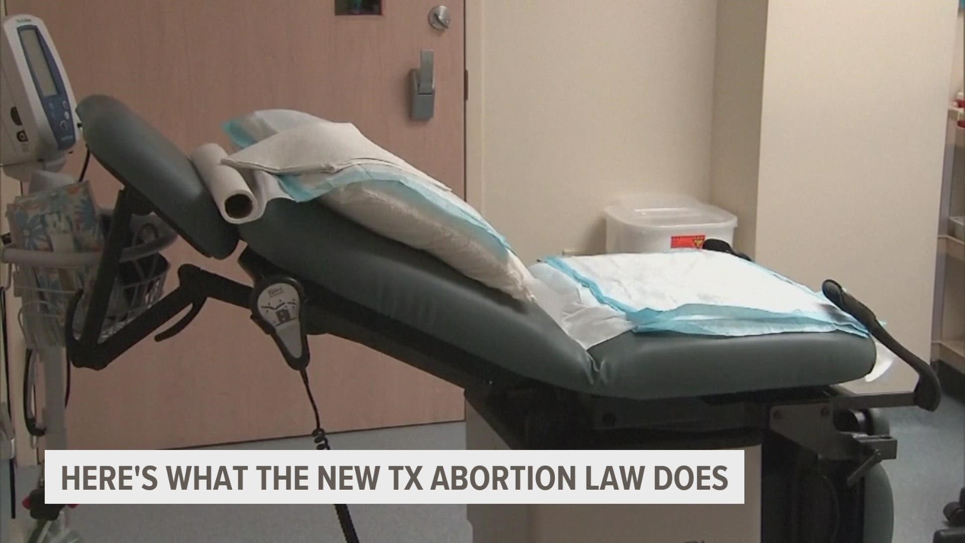 Iowa lawmakers have been working to further restrict abortions in the state, including a 24-hour waiting period signed by Gov. Reynolds last year.