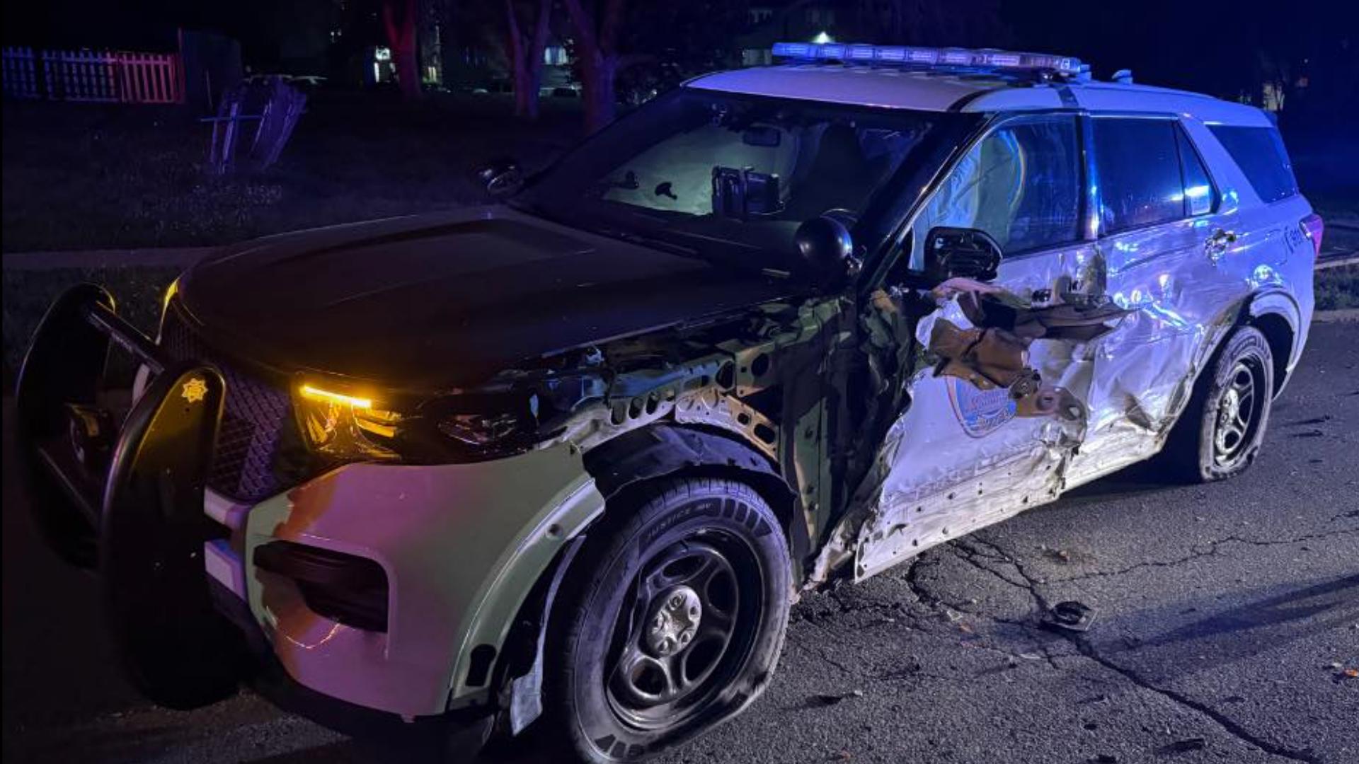 Both the driver and a Des Moines patrol officer suffered minor injuries in the crash. 