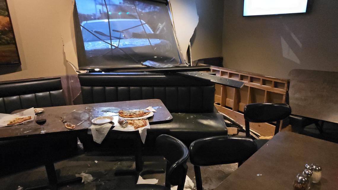 Driver charged after truck crashes into Johnston pizza shop