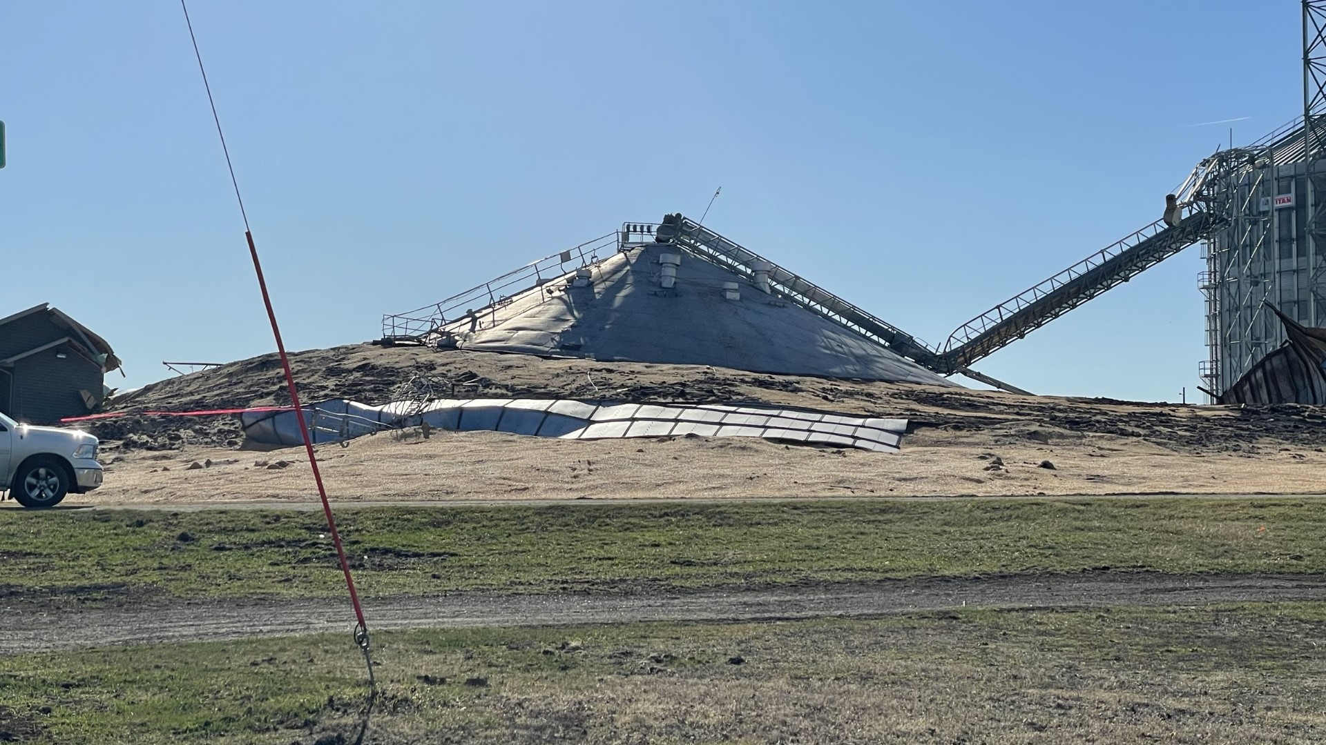 A grain bin containing 300,000 bushels of soybeans was found collapsed when Marshall County deputies arrived on scene.