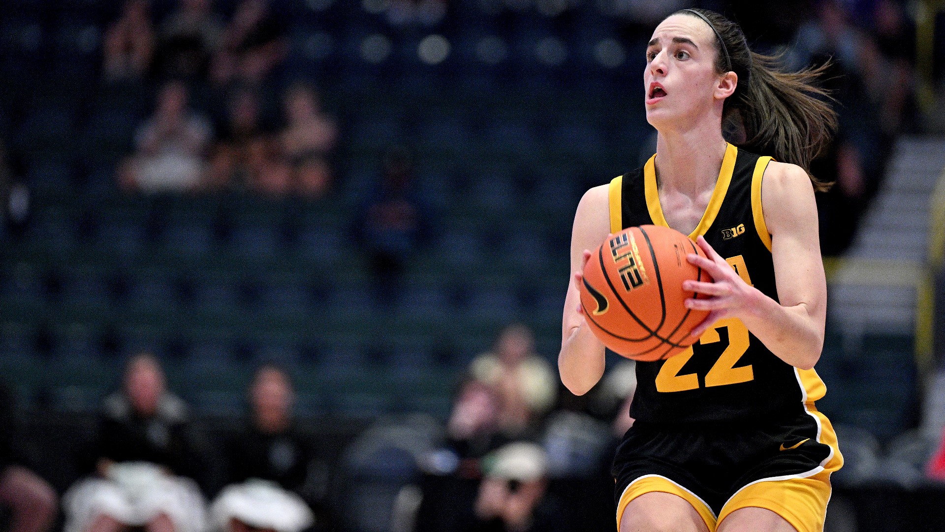 Iowa survived wasting a pair of double-digit leads before rallying to finally beat No. 16 Kansas State 77-70 in the championship game of the Gulf Coast Showcase.