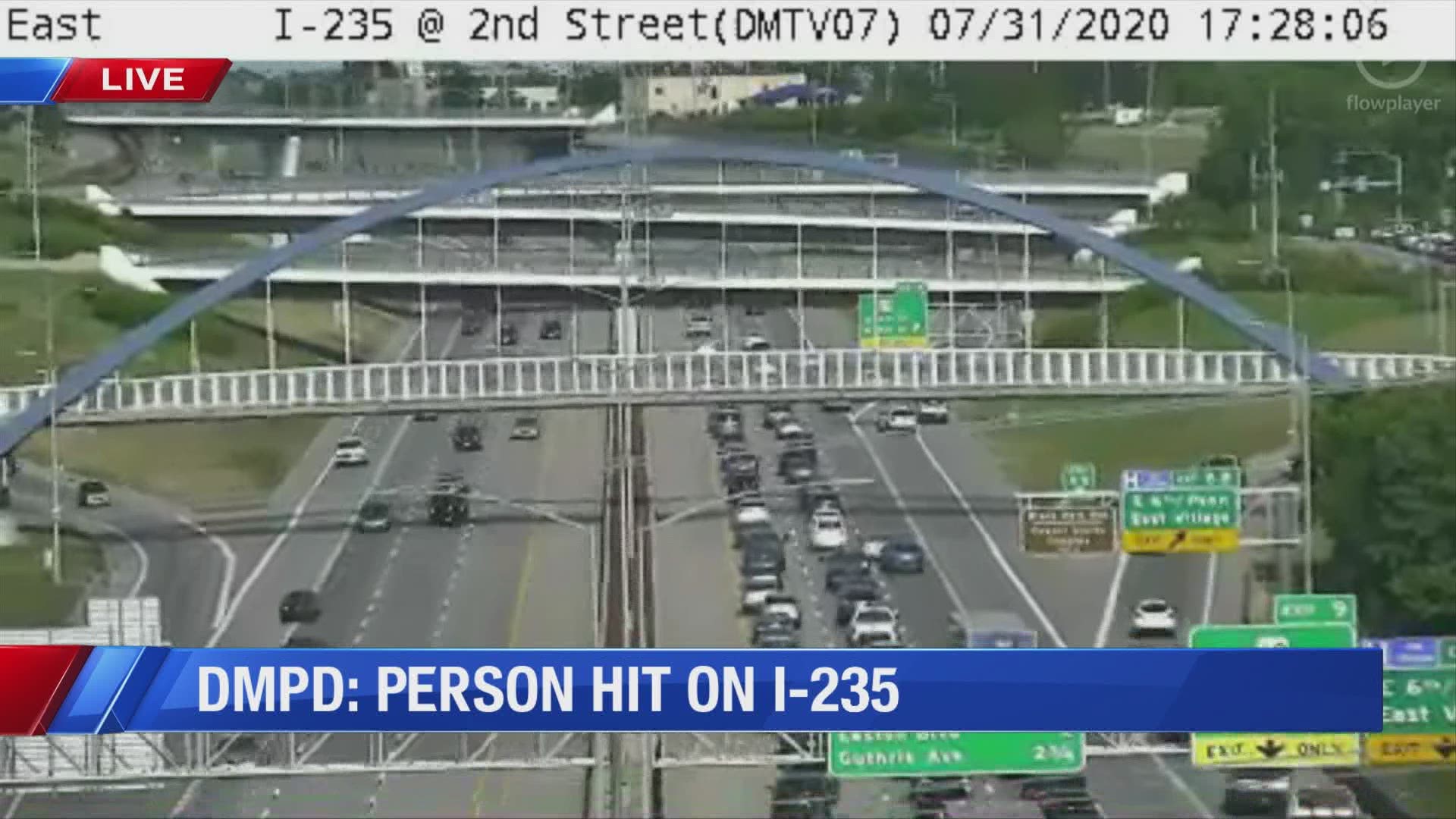 Des Moines Police say a car hit a pedestrian on I-235.