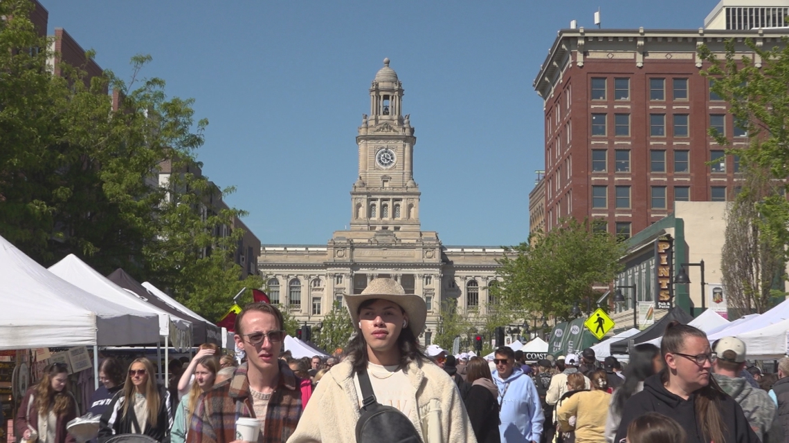 Vendors at the Des Moines Farmers' Market face rising costs due to increased gas and food prices, but attendees report prices remain reasonable and affordable.