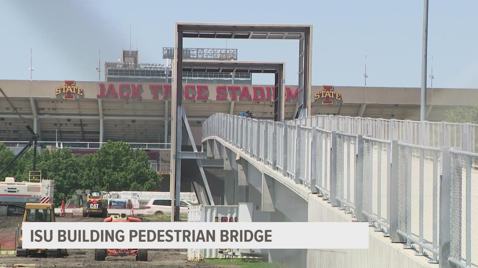 The bridge is designed to make getting to Jack Trice Stadium easier and safer for pedestrians. Iowa State says the bridge will be open by September.
