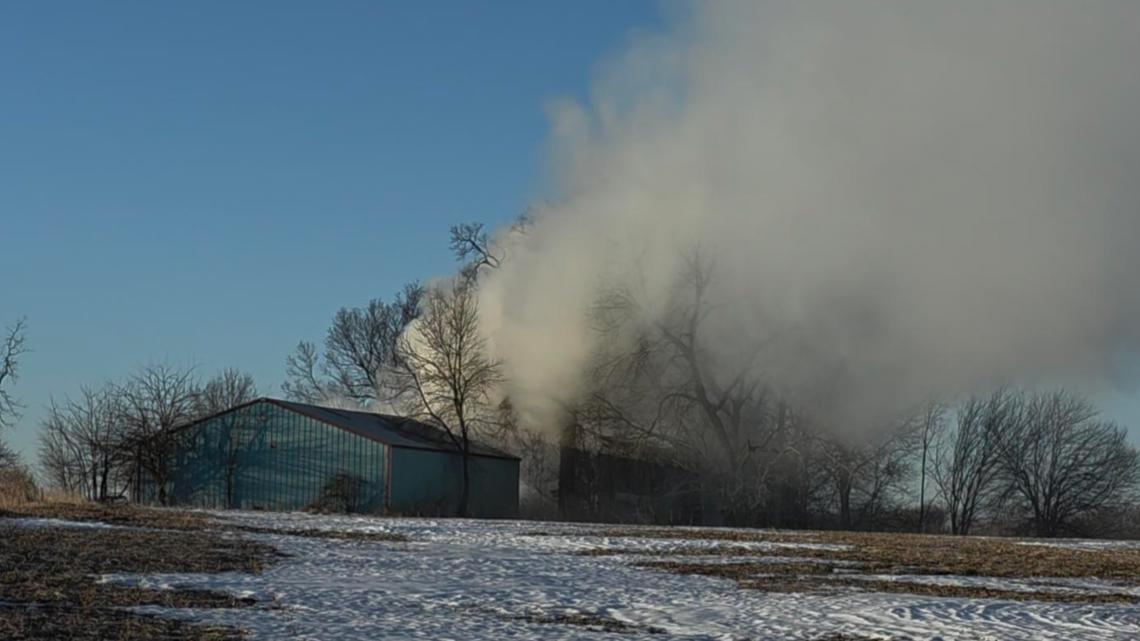 No injuries reported after two-story Des Moines home fully engulfed in fire early Friday