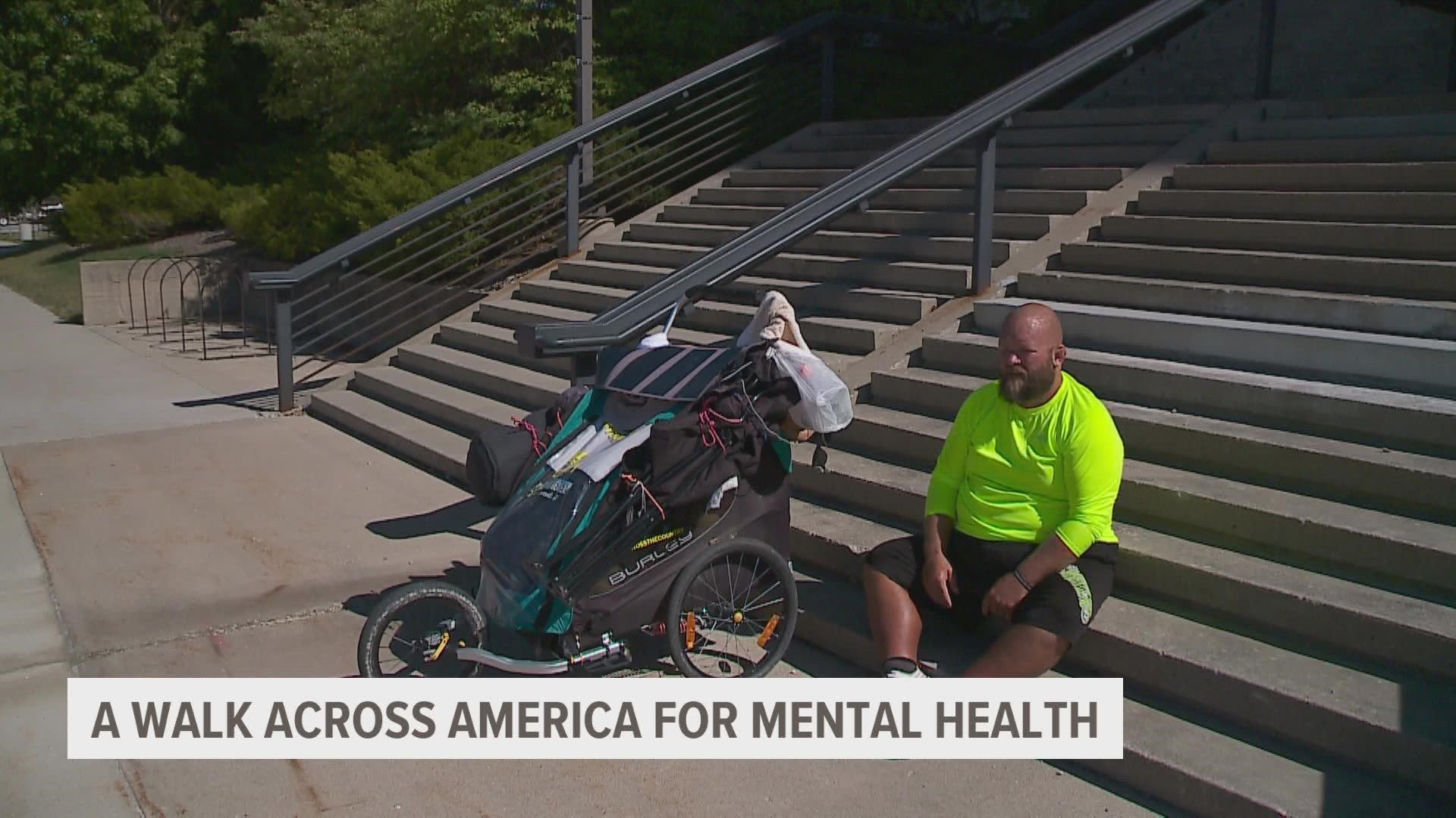 Joe Hall, who is walking from Delaware to California, stopped in Ames to share his story and advocate for mental health.