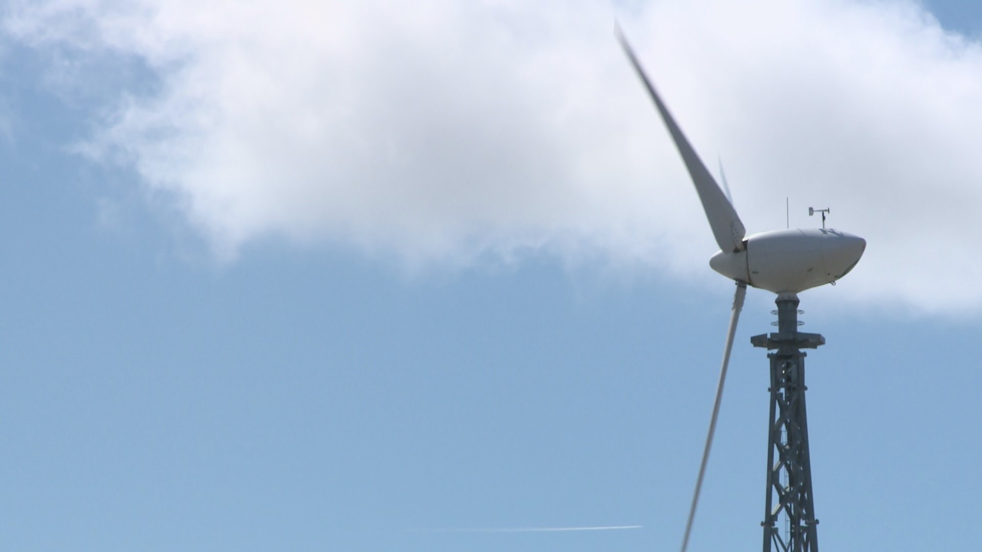 On Monticello farmer Jason Russell's farm, nearly 100% of the site's electricity is generated through his wind turbine and solar panels.