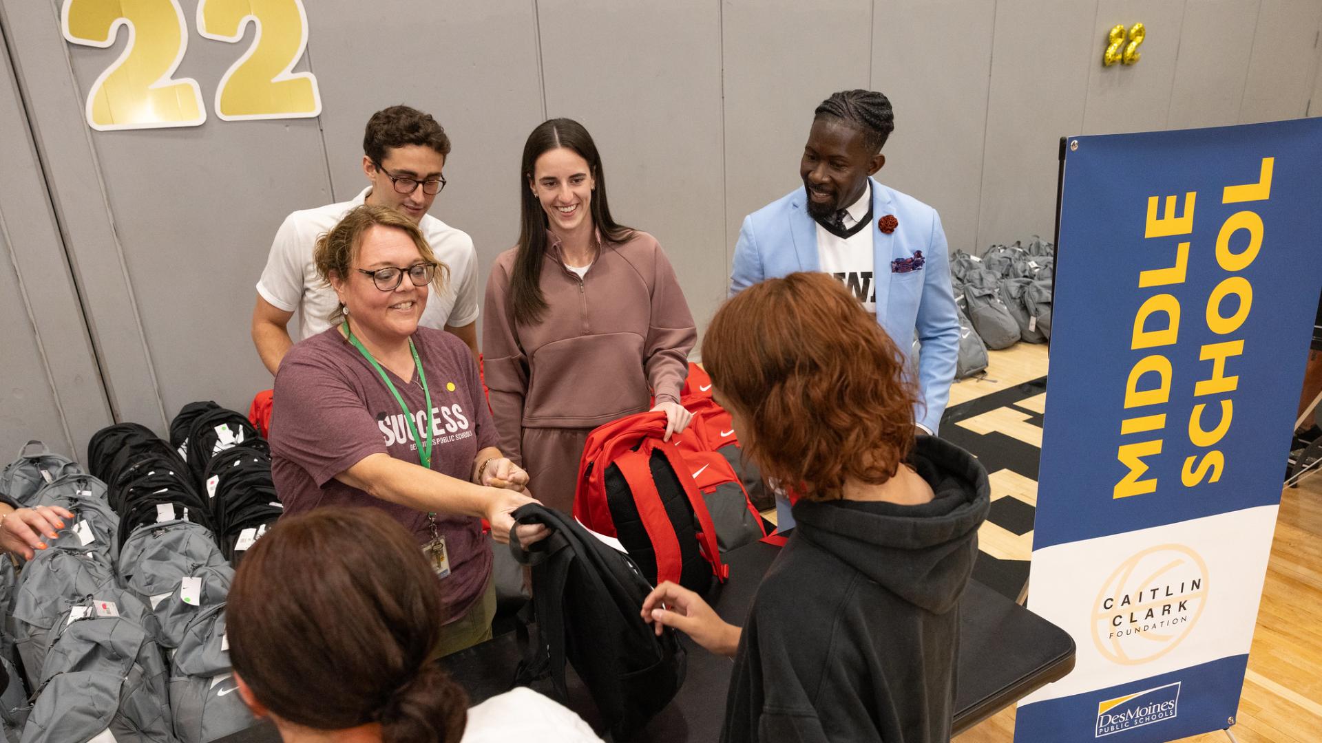 Caitlin Clark makes appearance at North High School for backpack giveaway