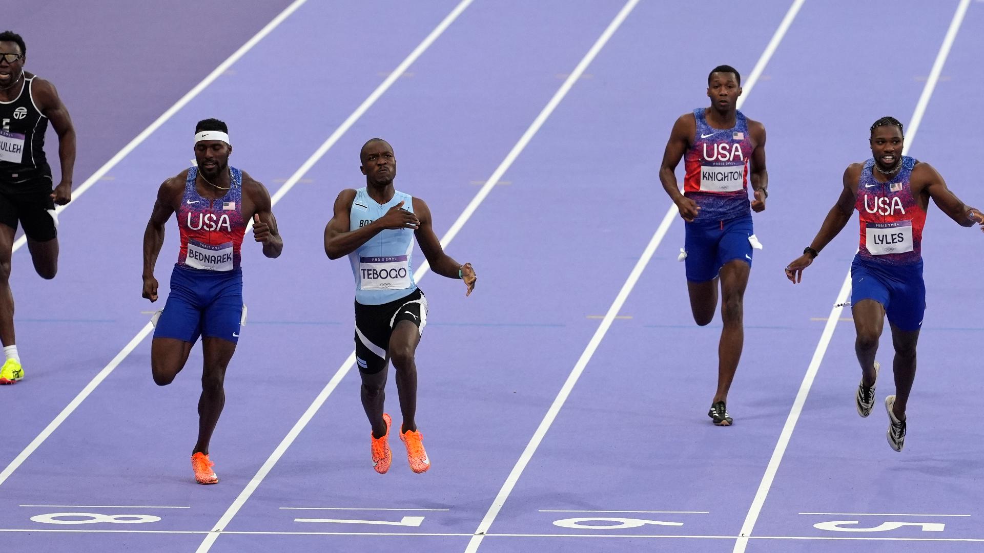 Noah Lyles lost the Olympic 200 meters Thursday, falling to Botswana's Letsile Tebogo, then being tended to by medics who carted him off the track in a wheelchair.