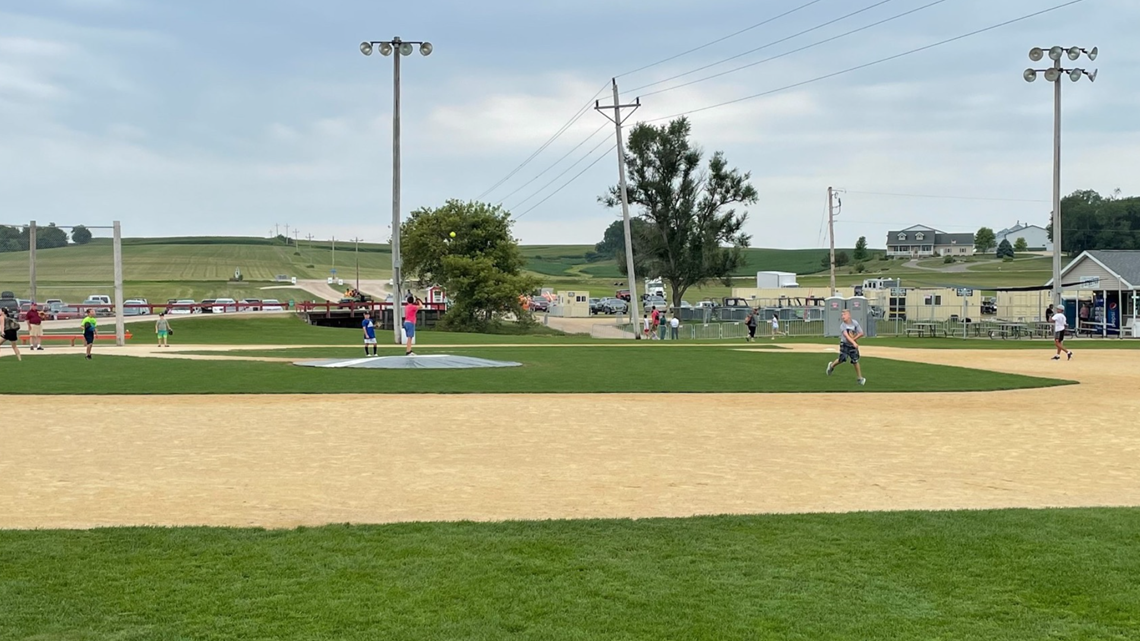 Dyersville, United States. 12th Aug, 2021. New York Yankees sit on the  stands from the 1989 movie set ballpark of the Field of Dreams as they  get ready for game at an