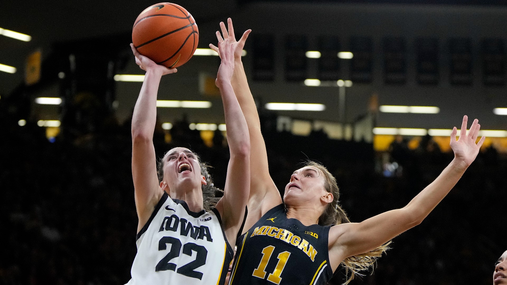Caitlin Clark became the NCAA women’s career scoring leader and set Iowa's single-game scoring mark with 49 points.