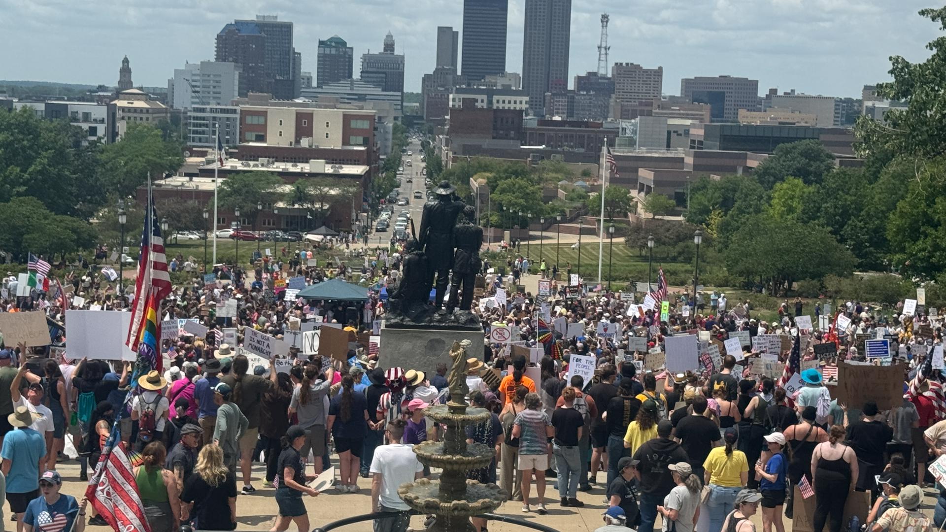 Iowans in attendance hoisted handmade signs and voiced concern on a number of causes.