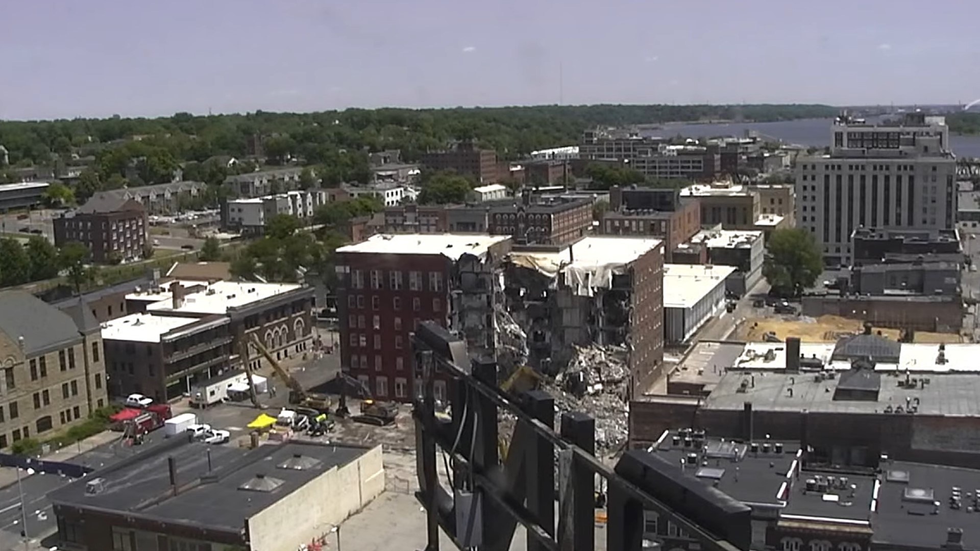 Andrew Wold pleaded guilty to a $300 city fine for the conditions at 324 Main Street in downtown Davenport. Now, the building is coming down.