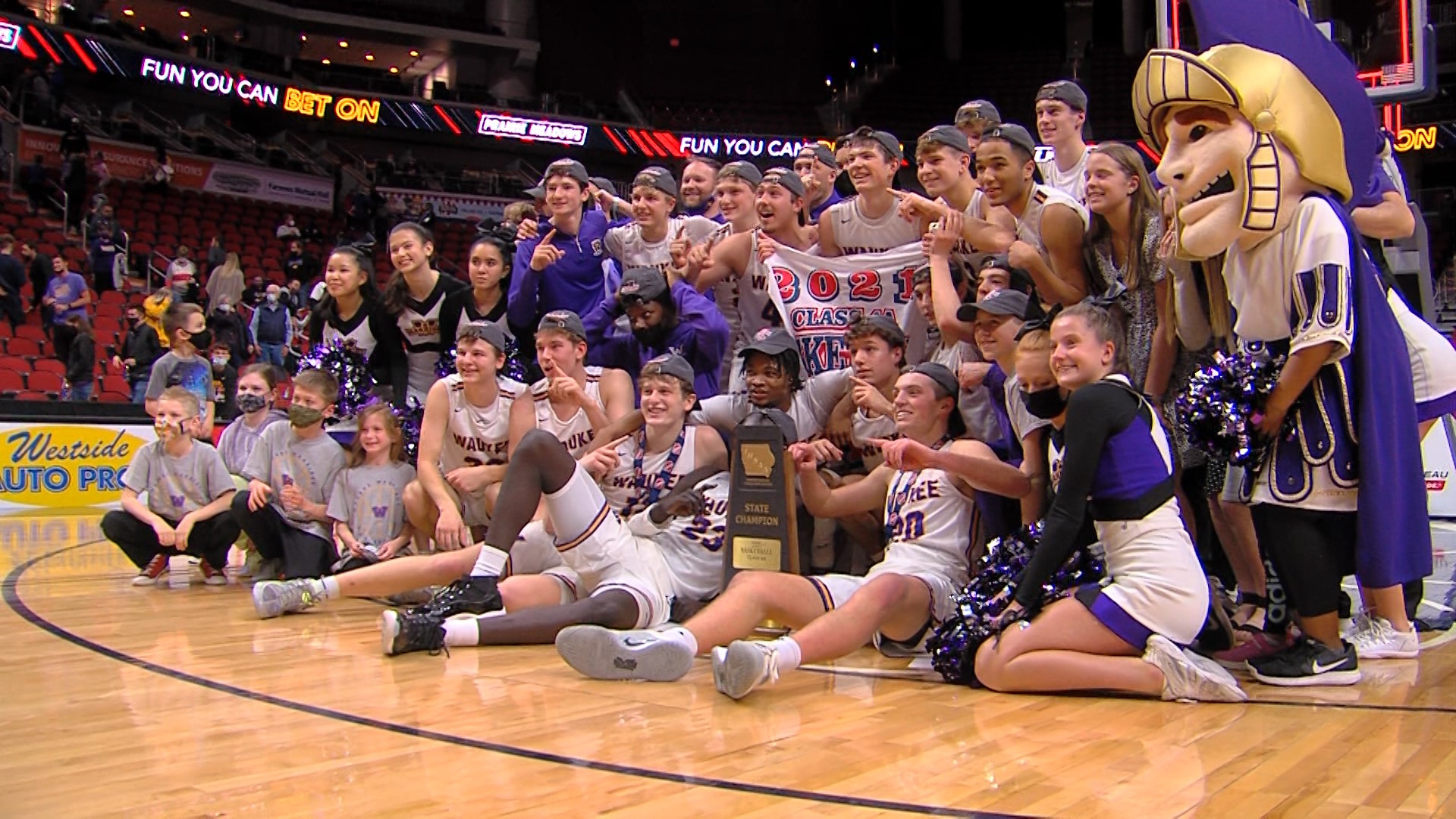 The Waukee Warriors trailed by double-digits in the first quarter only to come back and top the Johnston Dragons 61-50 to win Waukee's first state title.
