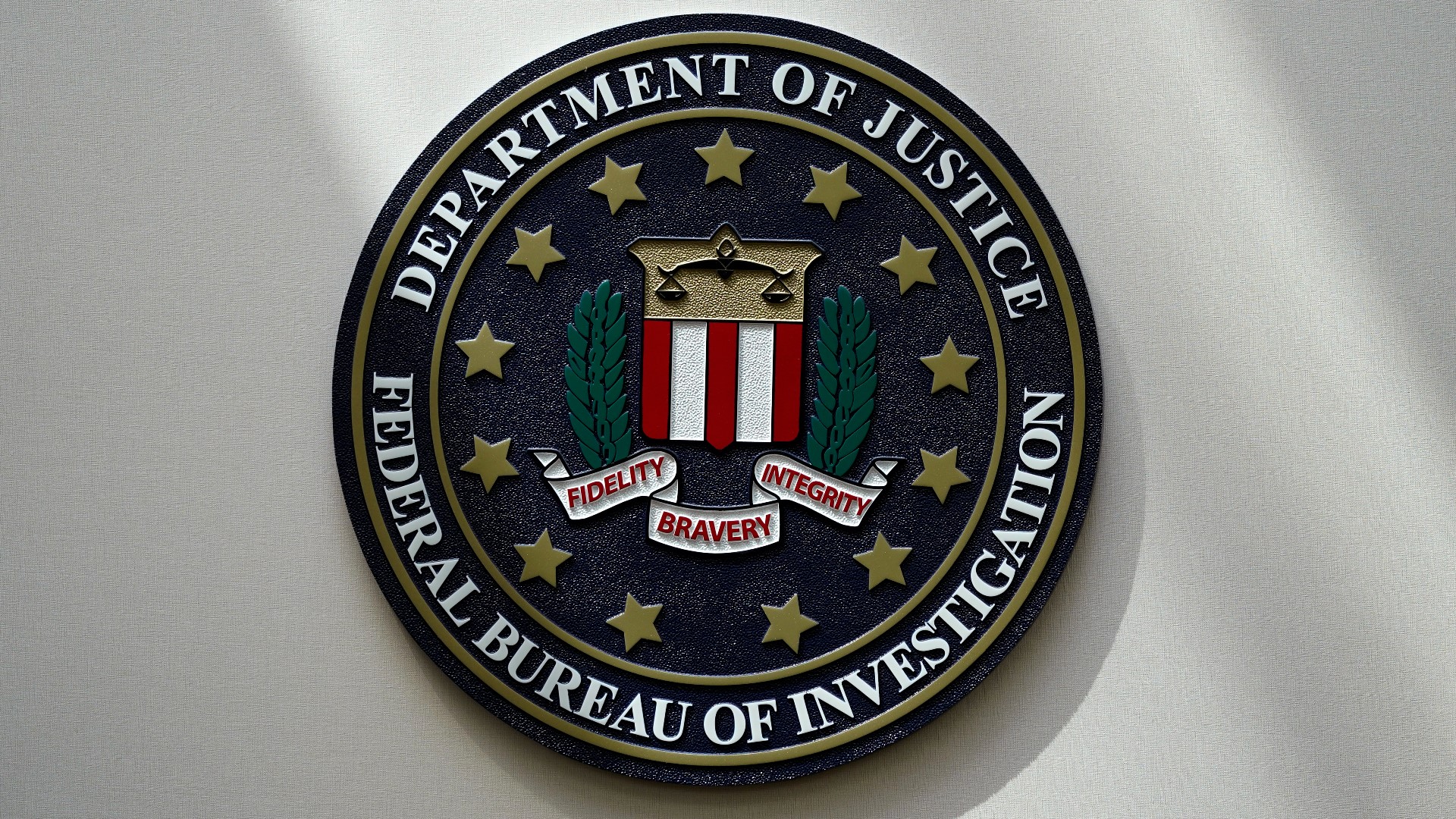The U.S. Department of Justice believes Jeffrey Gray captured images and videos of children undressing in changing rooms at his photography business.