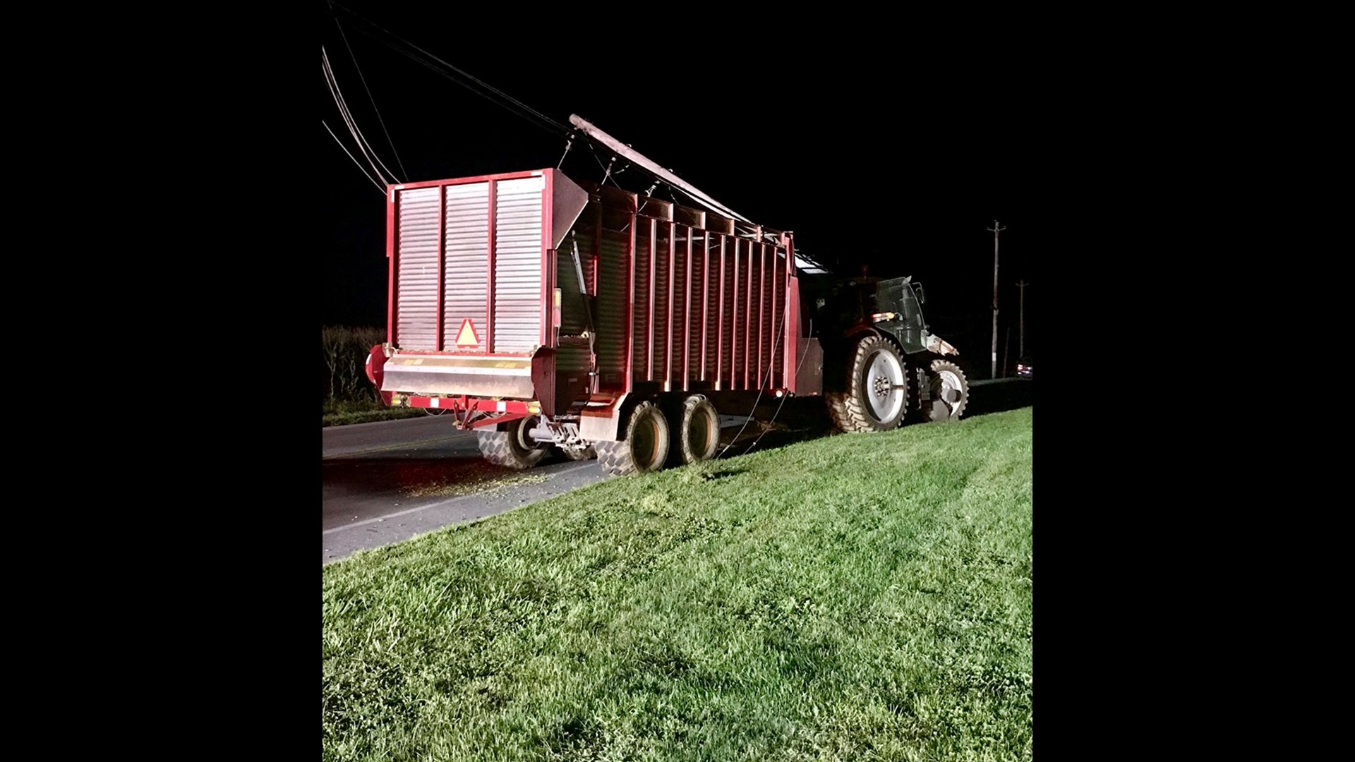Tractor striking utility pole causes power outage, road closure in