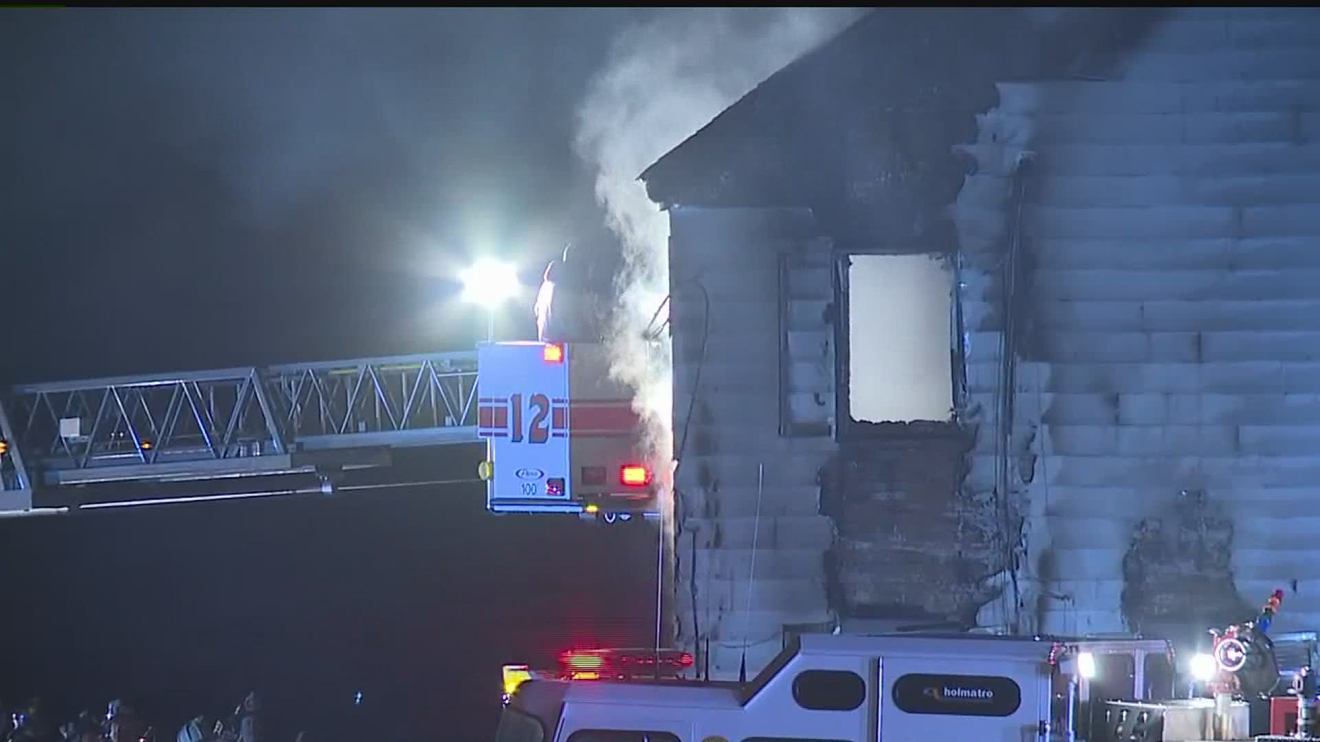 Two people are dead, including a firefighter, after a house fire in Cumberland County.