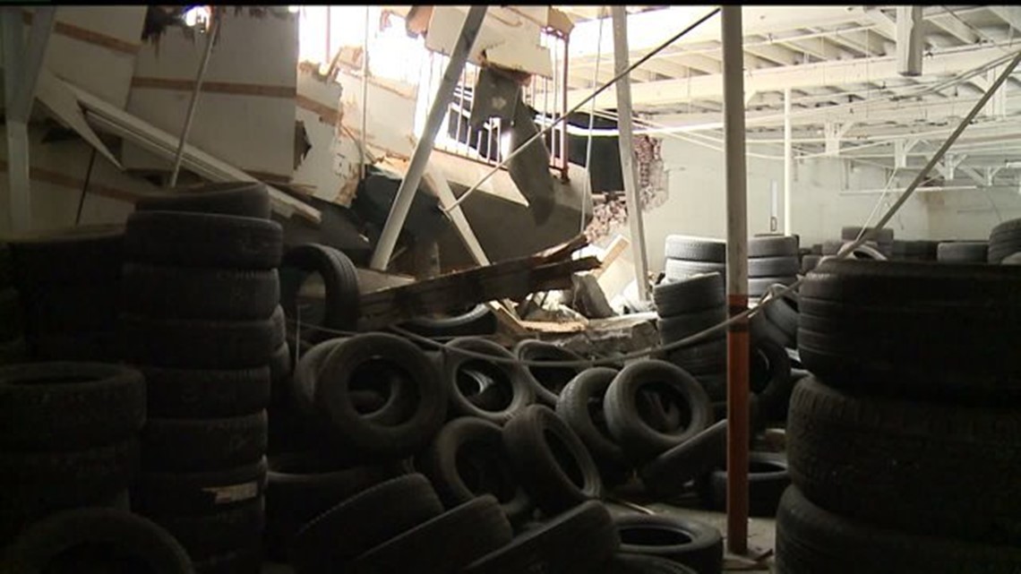 Harrisburg tire store damaged by May wall collapse closes up shop