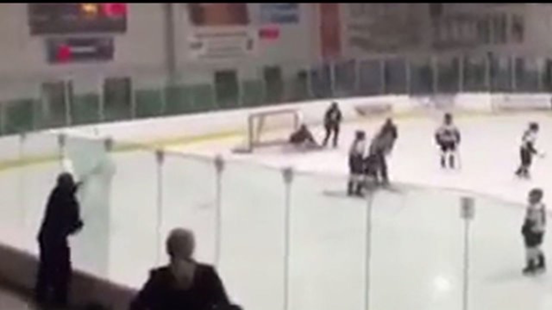 Irate Hockey Dad Breaks Glass