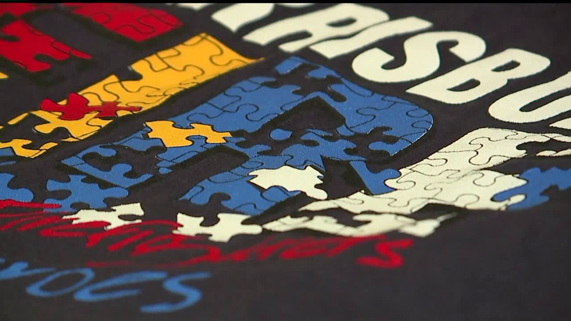 Firefighters sell shirts for Autism Awareness Month