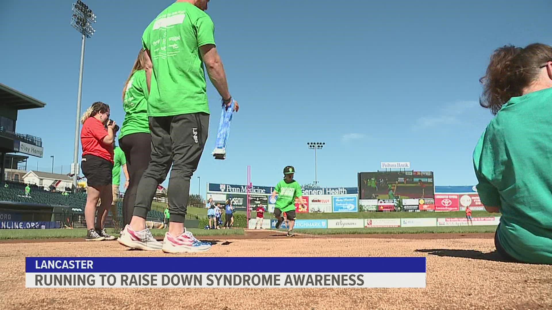 Many crossed the plate at Clipper Magazine stadium in Lancaster ahead of the game, raising thousands of dollars for down syndrome awareness.