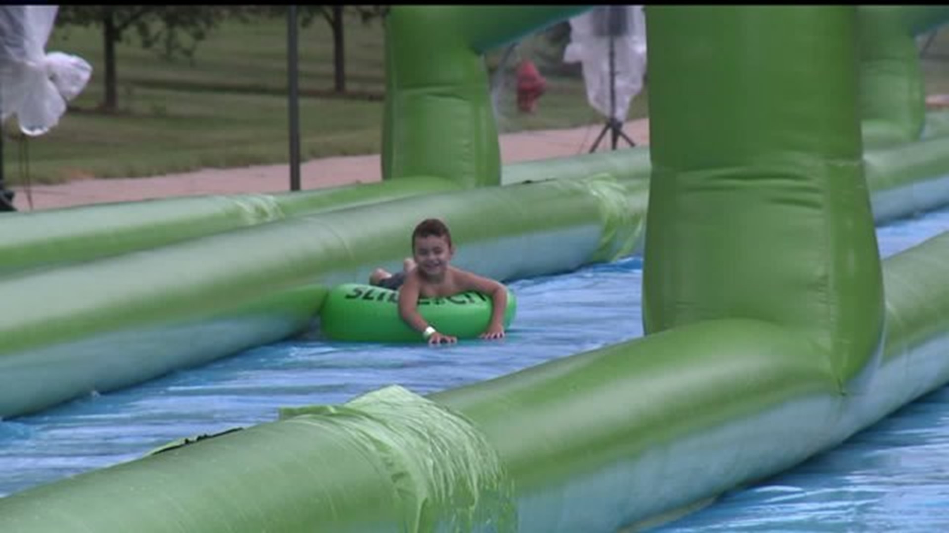 Hundreds enjoy Slide the City event in Lancaster despite the weather