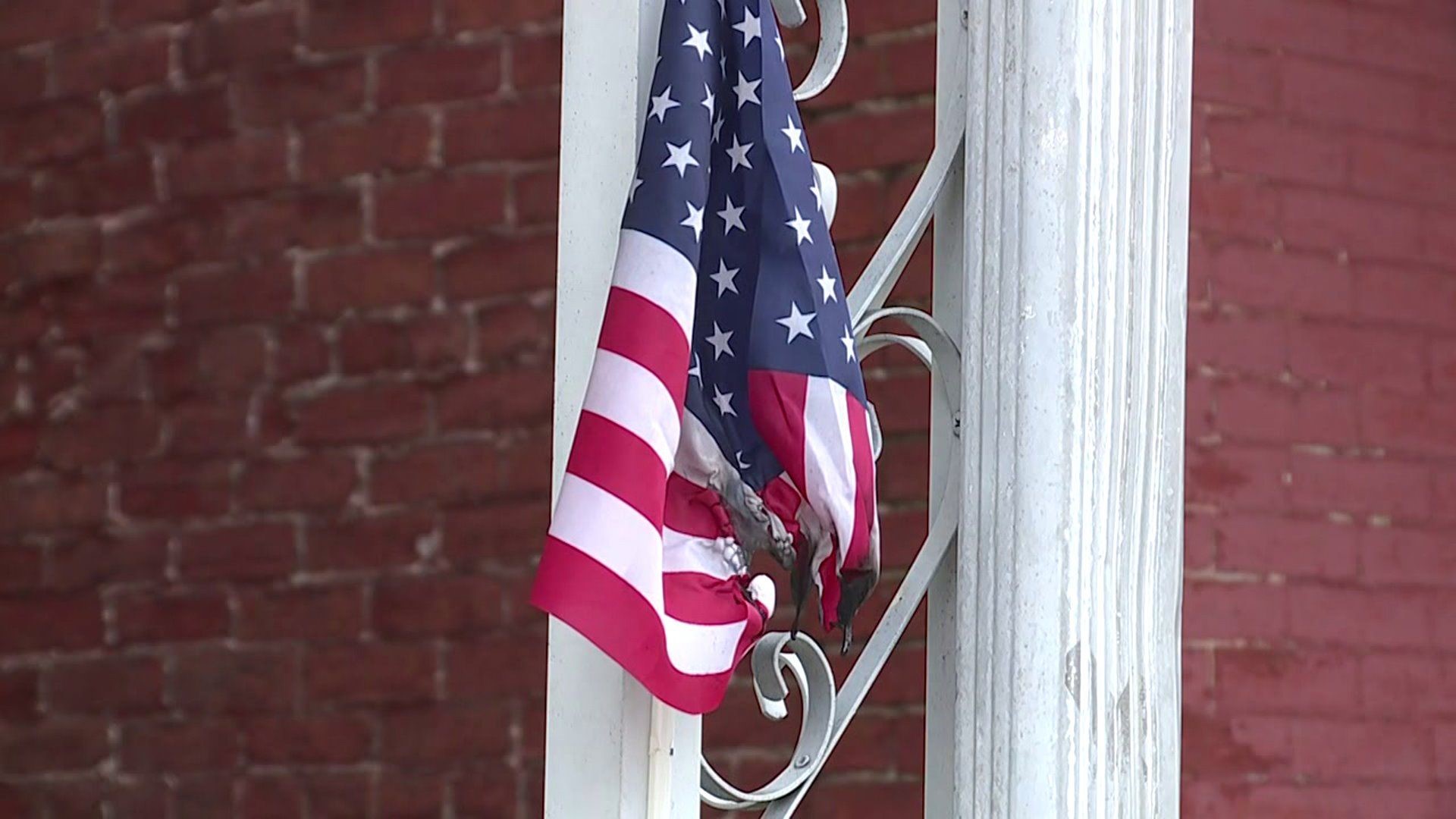Police seek to identify man who burned flags on porch of Lebanon home