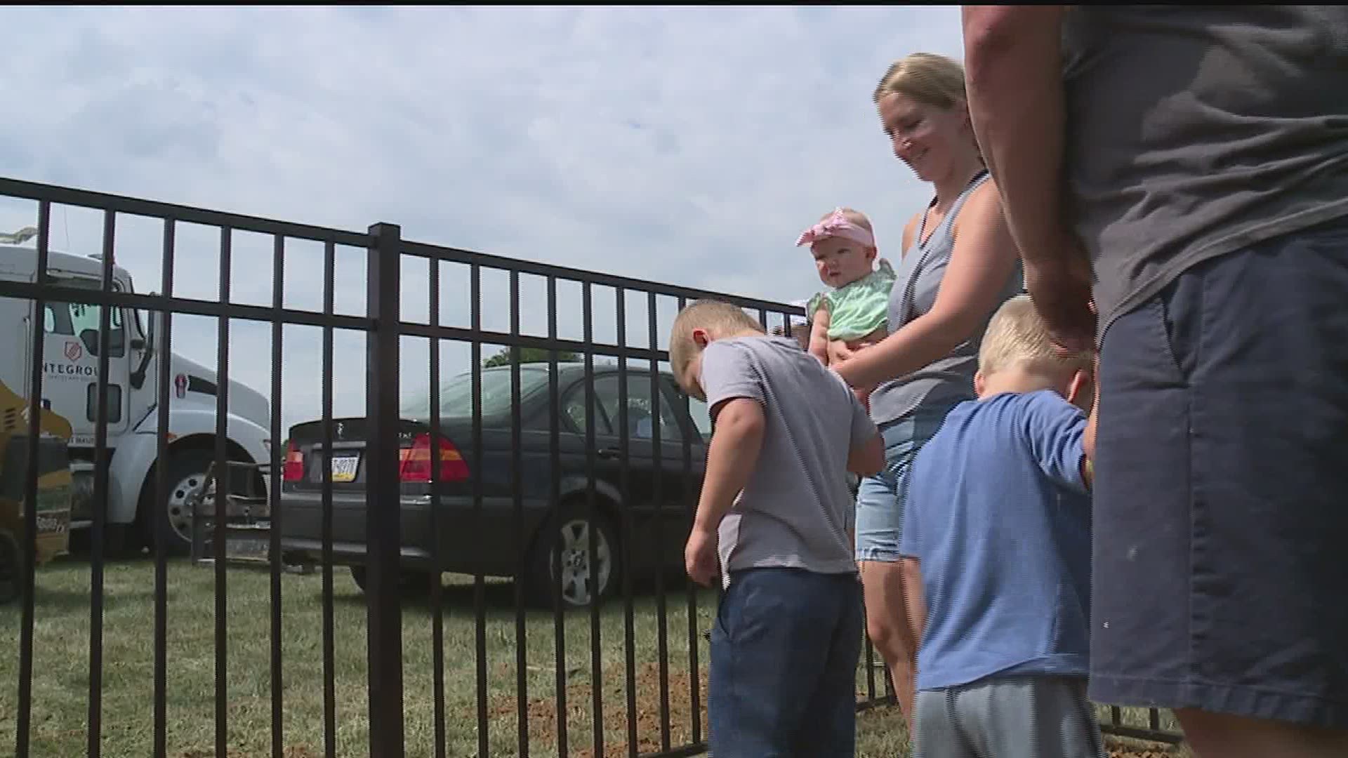A fence was donated and installed to help keep the special needs child safe.