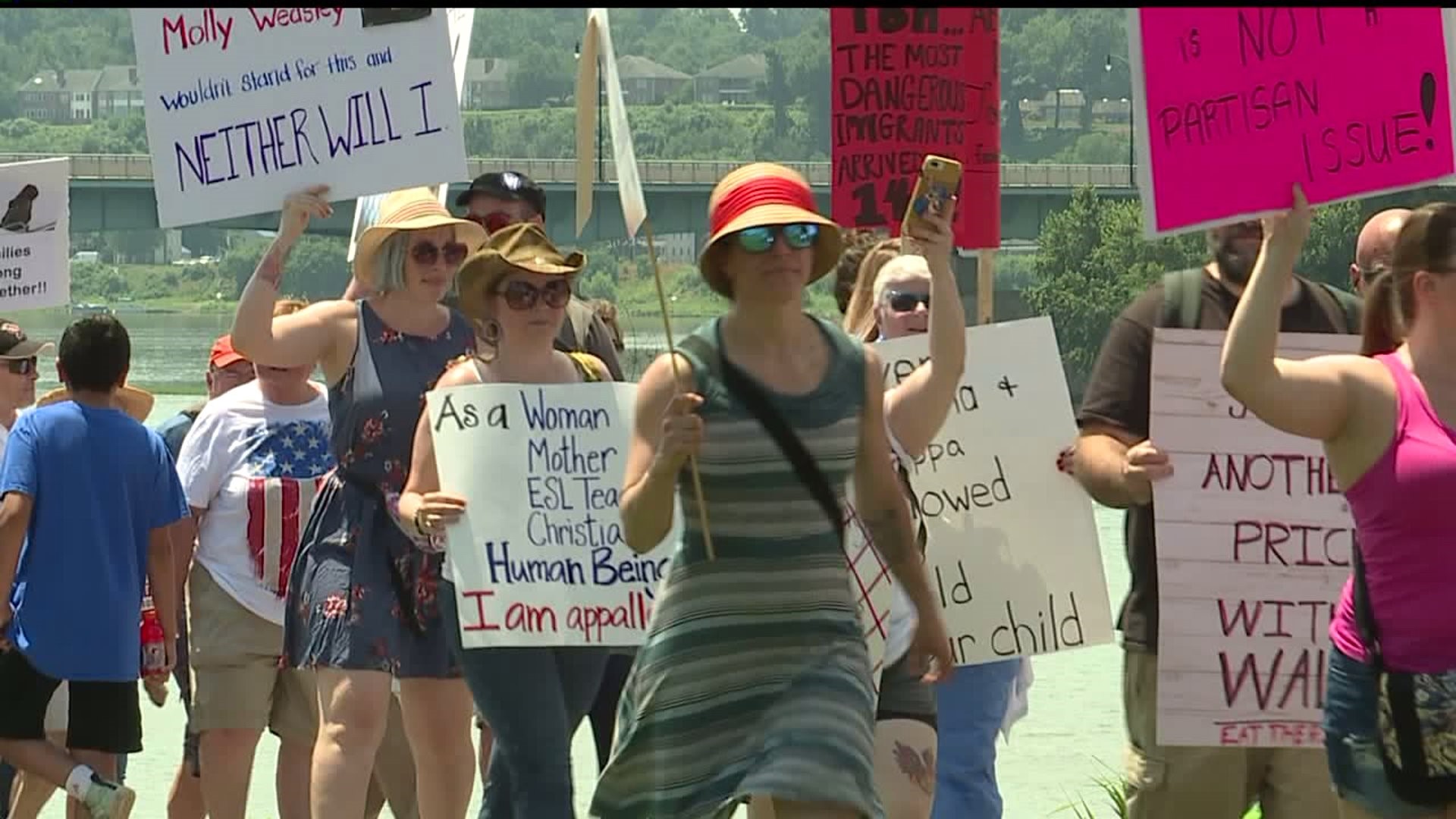 Hundreds attend `Families Belong Together` rally in Harrisburg