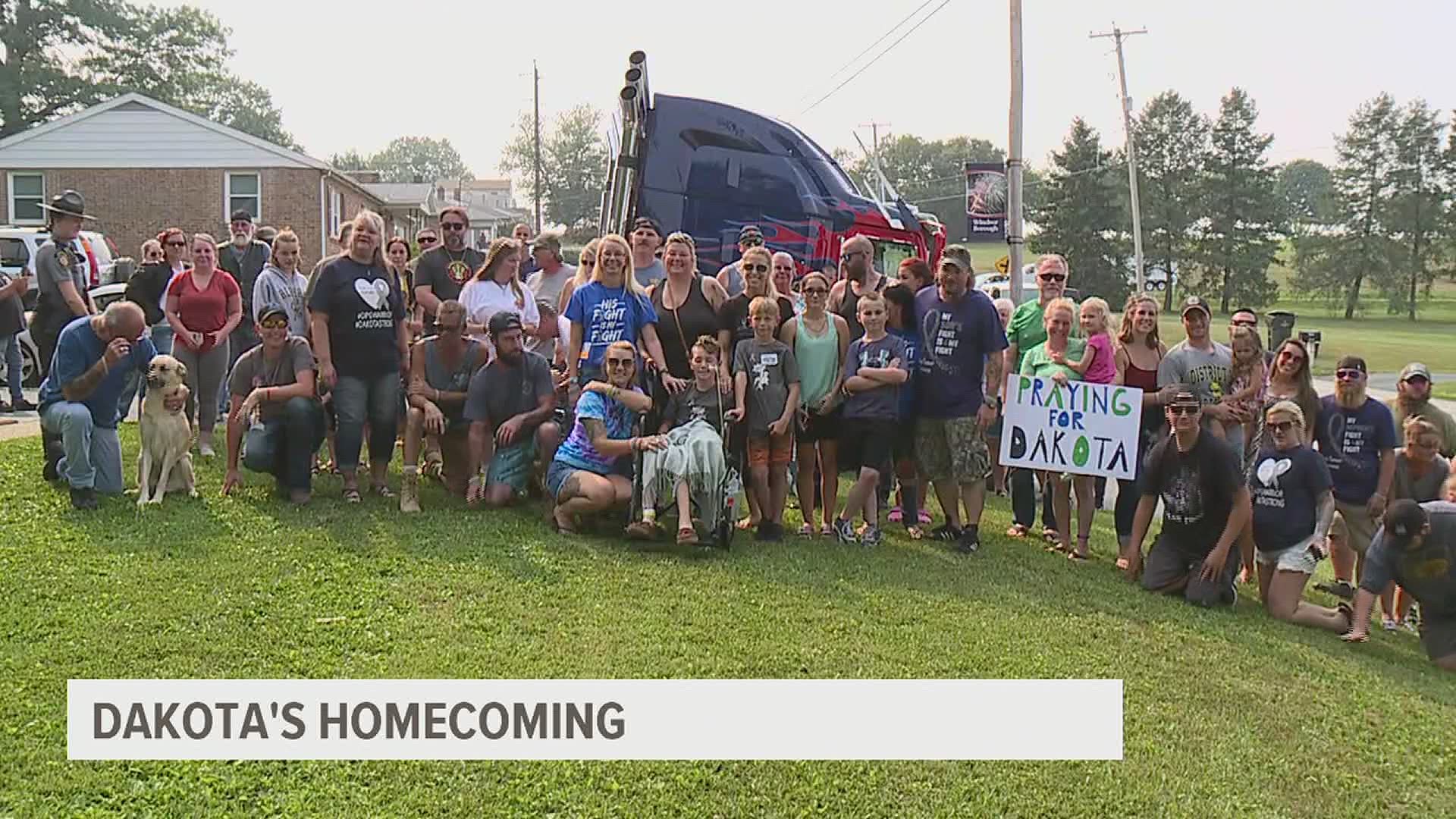 A police escort, Optimus Prime, and a community welcome home for a Hellam Township boy battling a brain tumor.
