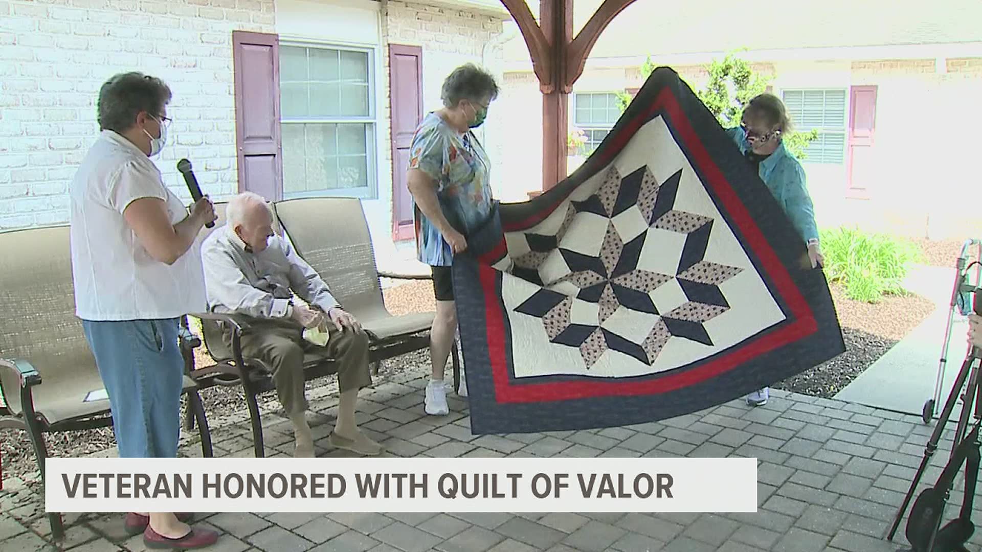 The Quilts of Valor Foundation hosted a presentation for Allen Zeigler, including other veterans and his family members at Country Meadows Retirement Communities.
