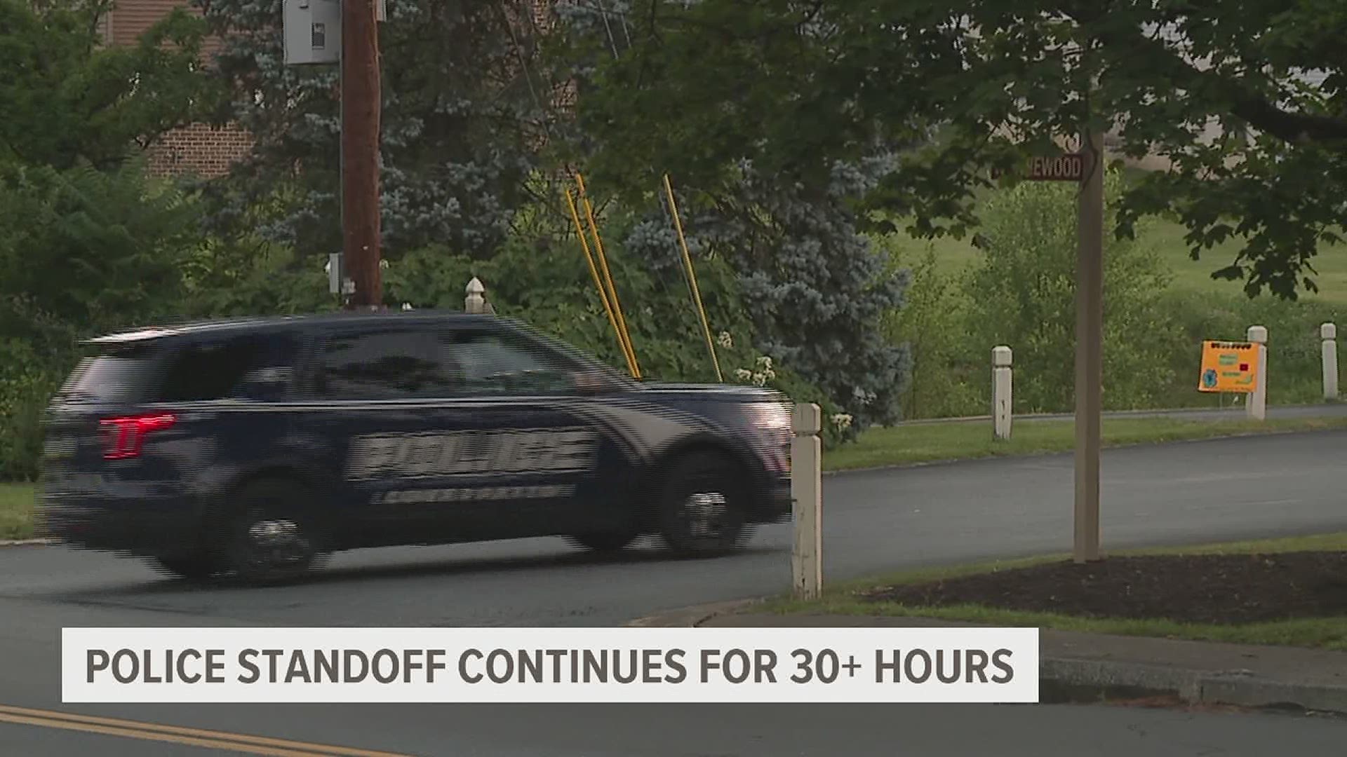 Police have taken Derrick Hutcherson, 36, into custody after a standoff that lasted over 30 hours. Both hostages are safe.