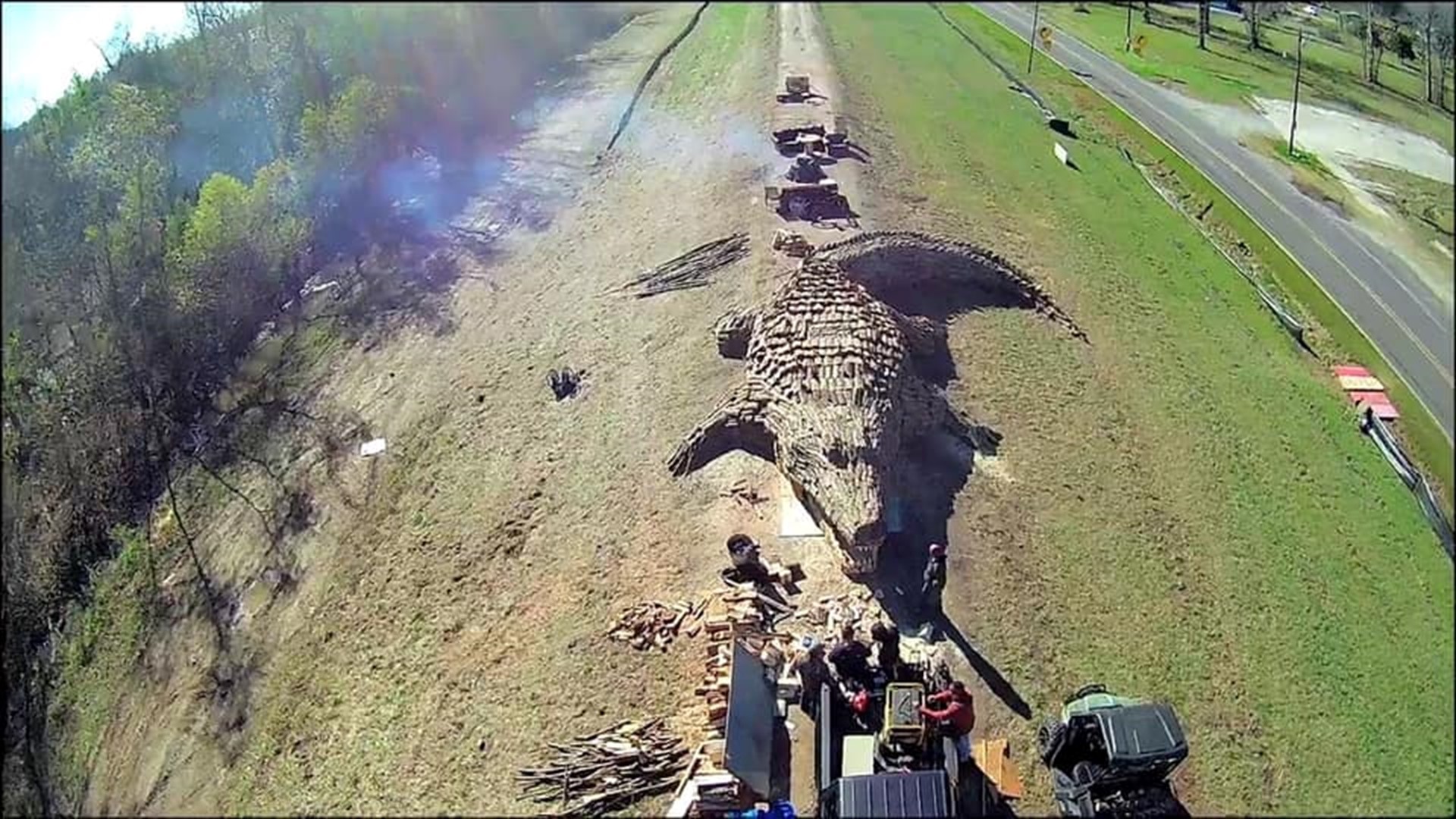 Massive 60foot alligator bonfire built on Mississippi River levee