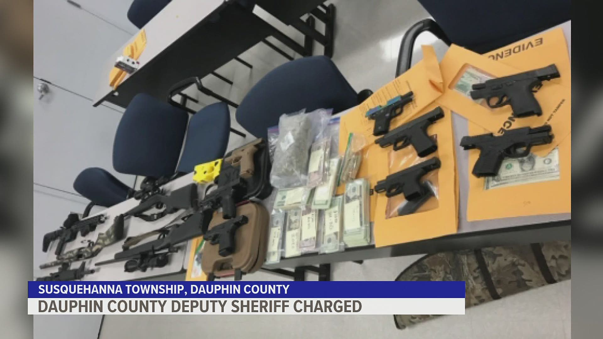 Investigators found a half-pound of marijuana, 11 guns, and $28,000 in cash in the home of Deputy Sheriff Christopher Reid last week, police say.