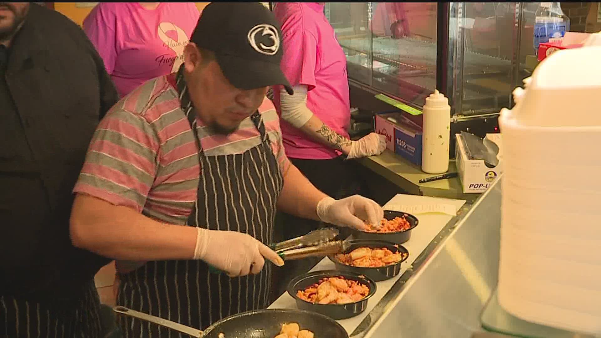 'A labor of love': Fuego Latino owner Gerson Pinzon says he treats those families as if they were his own - preparing different warm meals for them every day.