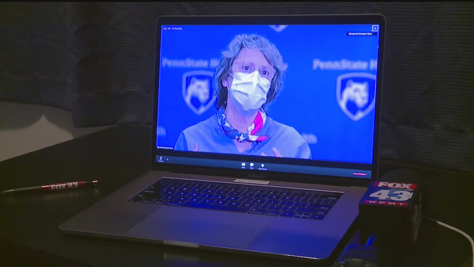 The virtual media briefing features healthcare workers from the Special Pathogens Team