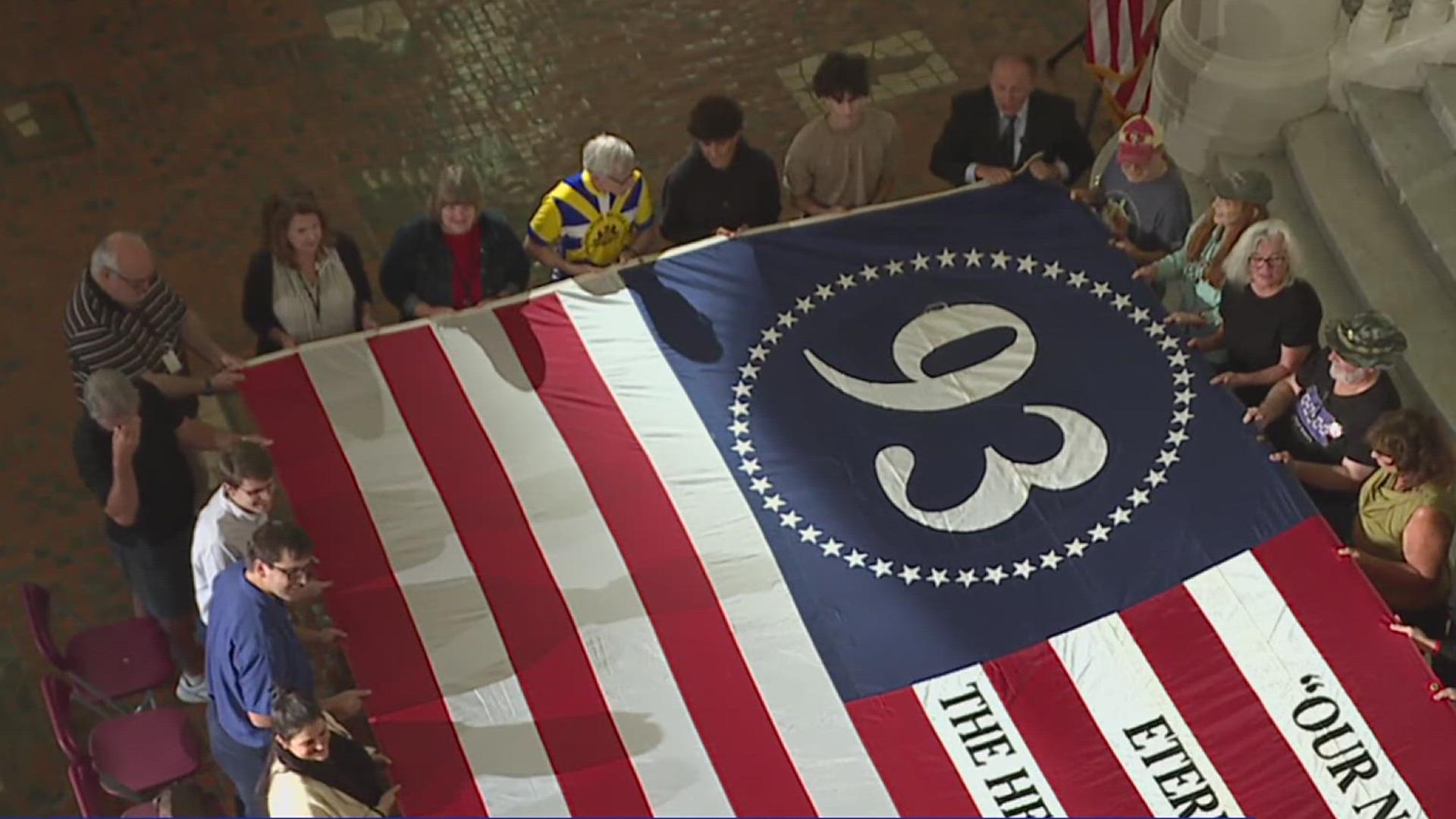 Attendees witnessed a rare moment involving the Hero Flag before it goes to the Smithsonian.