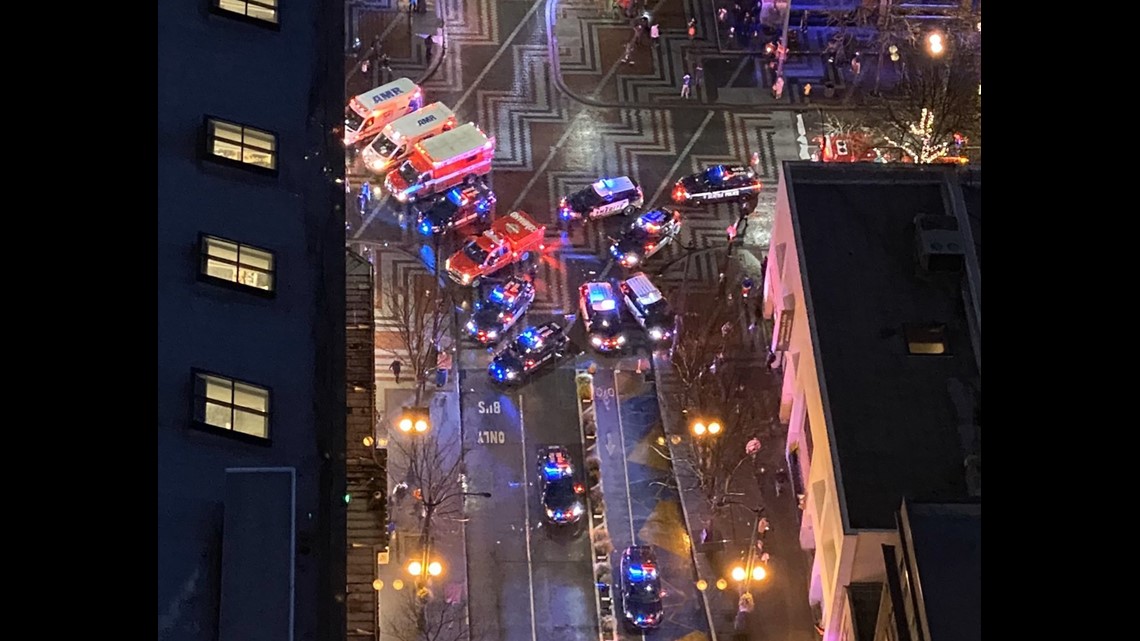 Seattle Police arrest one in deadly downtown shooting, search for two ...