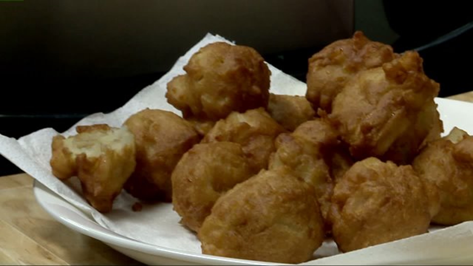 Frying up apple fritters with Bair`s Fried Chicken!