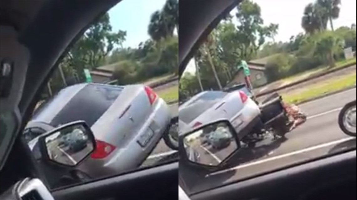 Car runs over motorcycle in bizarre road rage incident caught on video ...