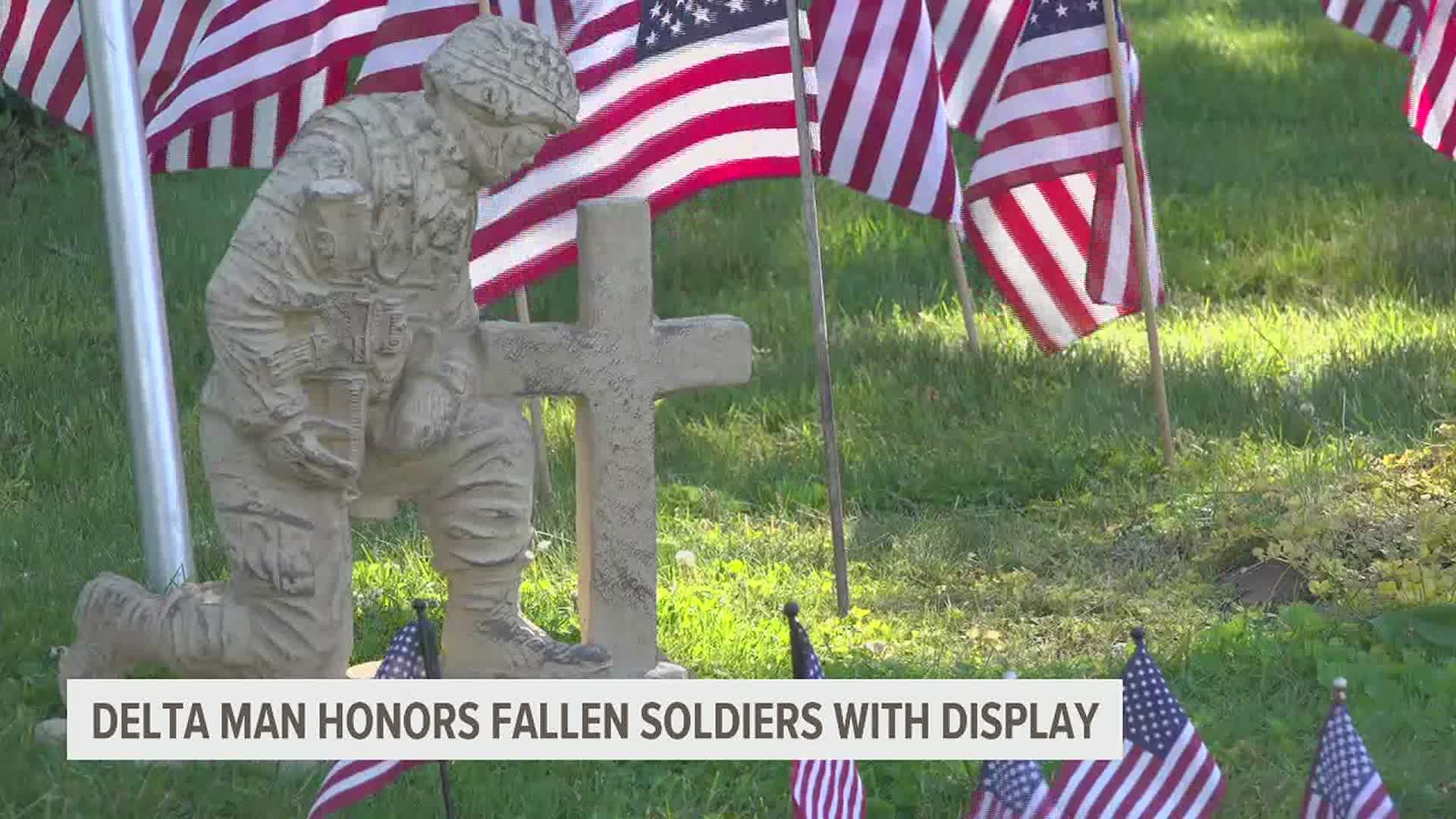 Jerry Barbour started placing flags on the front yard of his home five years ago.