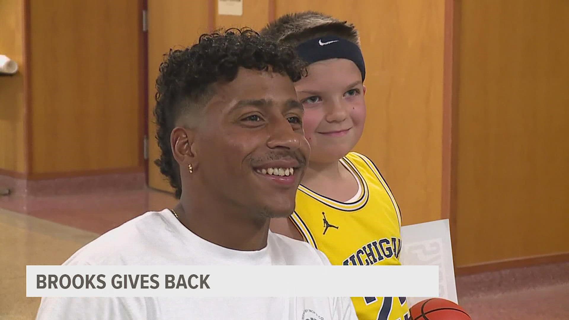 The Spring Grove grad came home to raise money for kids in need of new sneakers.