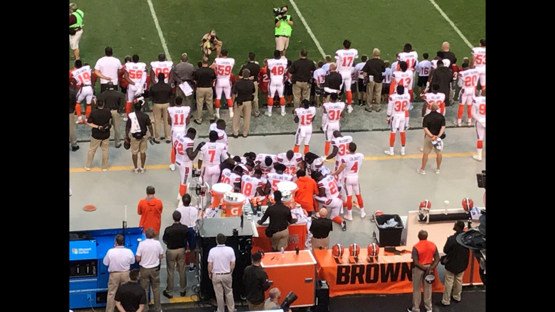 Cleveland Browns players kneel, huddle during national anthem