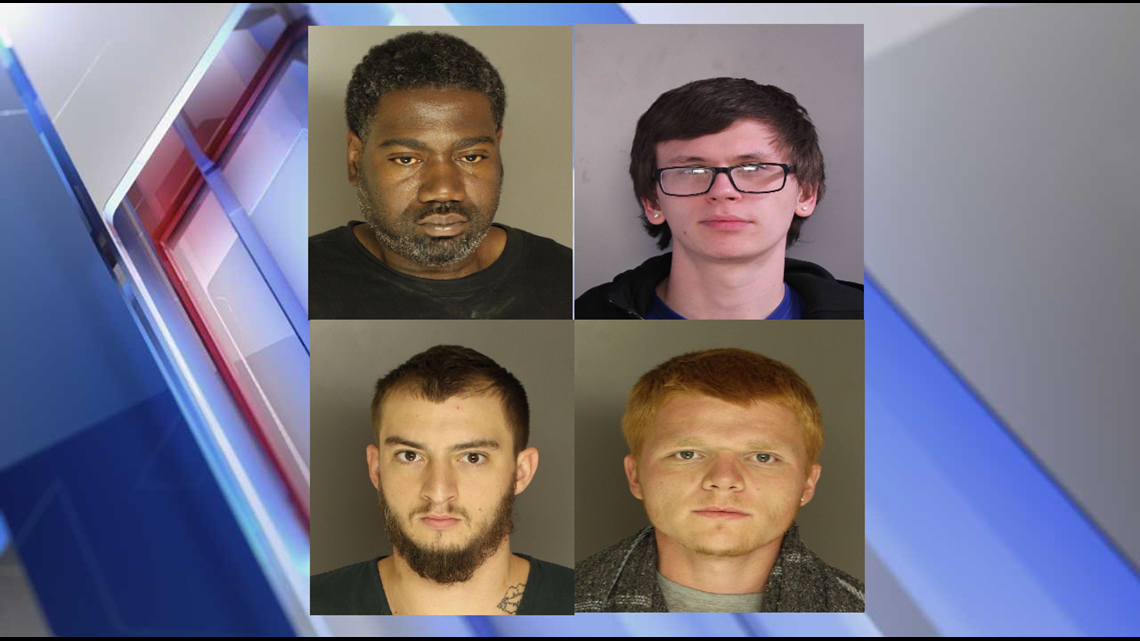 Four men arrested, accused of robbing victim at knifepoint in