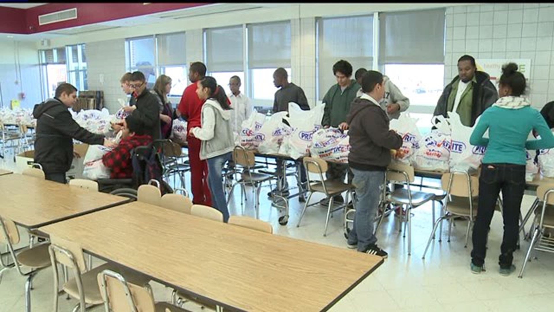 Food bags handed out to students at Hannah Penn School
