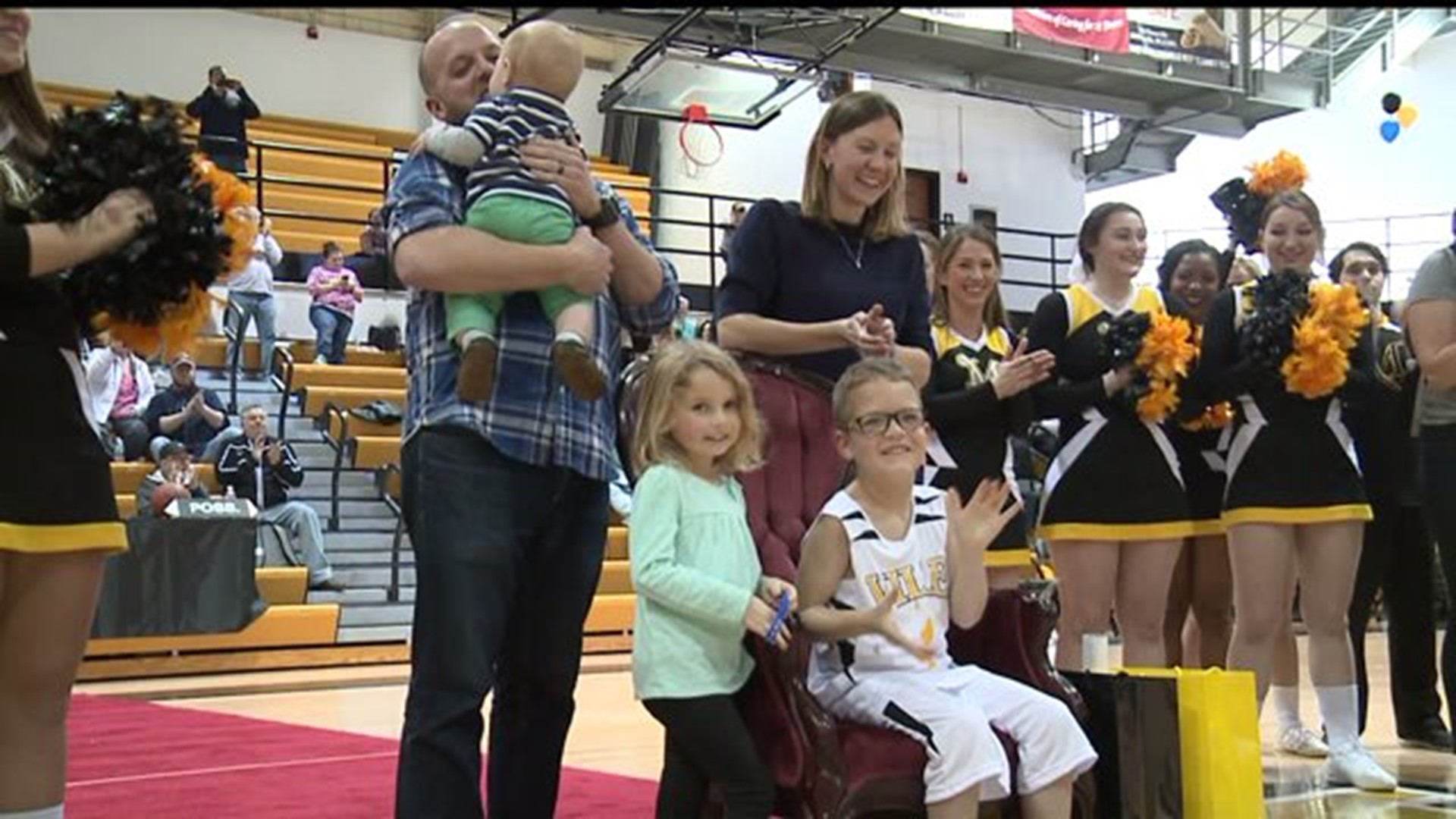 Local boy receives a very special welcome at Millersville basketball game
