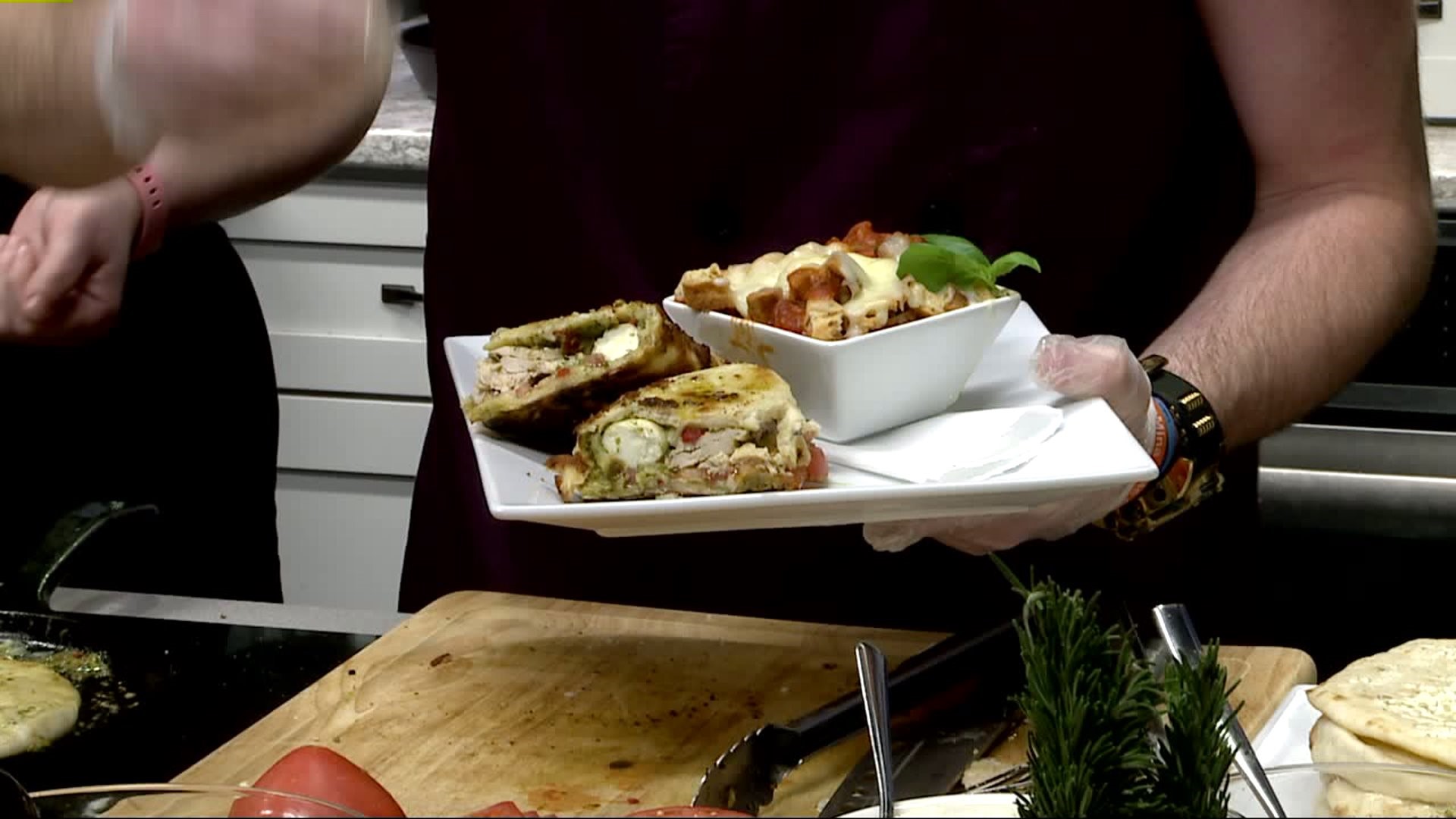 Olivia`s prepares a Chicken Caprese Panini served with Cream of Tomato Basil Soup
